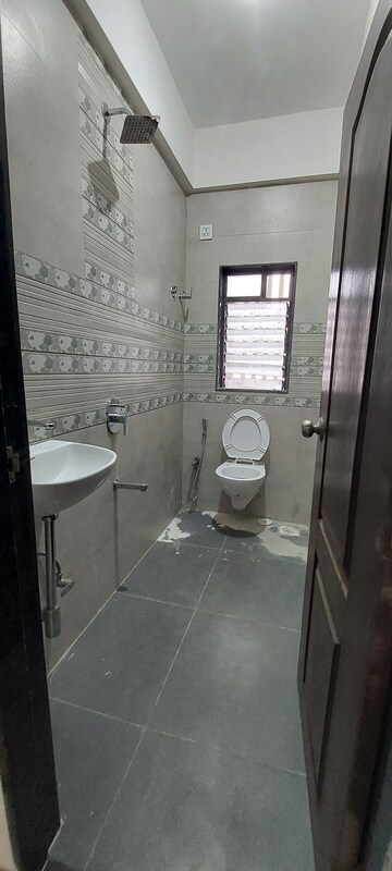 Bathroom in 3 BHK Apartment at Sai Siddhath Nagar Satyadeep, Goregaon West – for Sale