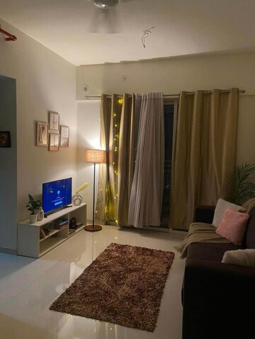 Living Room in 1 BHK Apartment at JP North Barcelona, Mira Road – for Rent