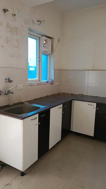 Kitchen in 3 BHK Apartment at Newtech La Galaxia, Surajpur – for Rent