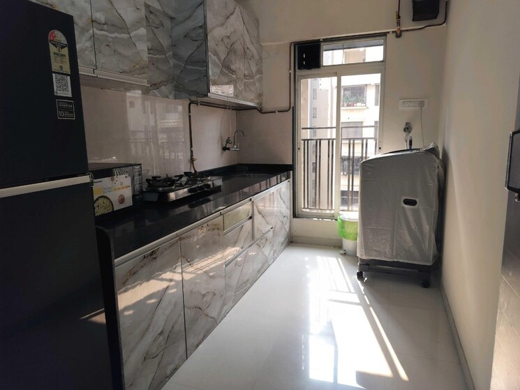 Kitchen, dn nagar 2 Bedroom 670 Sq.Ft. Apartment In Dn Nagar Mumbai 9010504