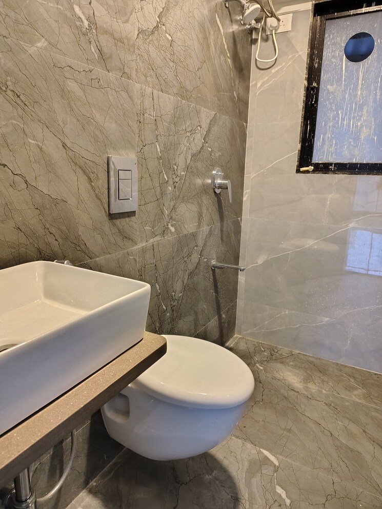 Bathroom, paradigm-artteza 2 Bedroom 735 Sq.Ft. Apartment In Santacruz West Mumbai 9010692