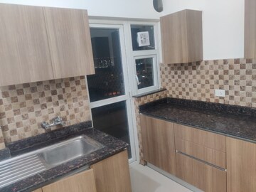 Kitchen in 3 BHK Apartment at Adani M2K Oyster Grande, Sector 102 – for Sale