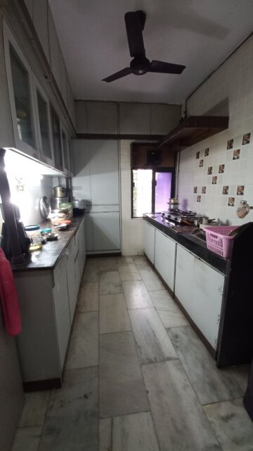 Kitchen in 2 BHK Apartment at Arjun CHS Vasant Vihar, Vasant Vihar – for Sale