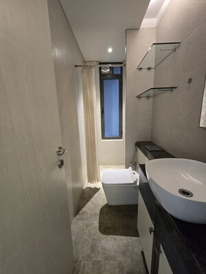 Bathroom in 3 BHK Apartment at Kalpataru Sparkle, Bandra East – for Rent