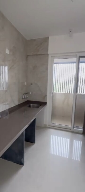 Kitchen in 3 BHK Apartment at Nirman Adi, Kalyani Nagar – for Rent