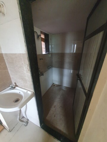 Bathroom in 1 BHK Apartment at Vantage Green Woods, Shilphata – for Rent