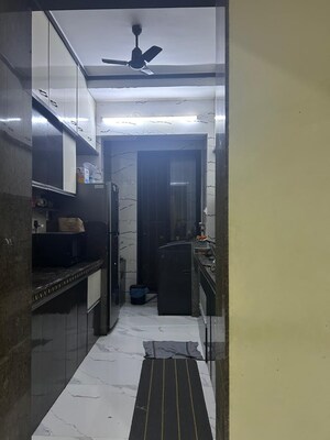 Kitchen in 1 BHK Apartment at Tharwanis Rosalie, Tawri Pada – for Sale