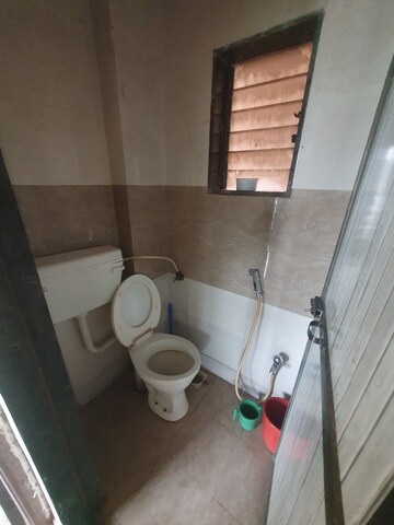 Bathroom in 1 BHK Apartment at Vantage Green Woods, Shilphata – for Rent