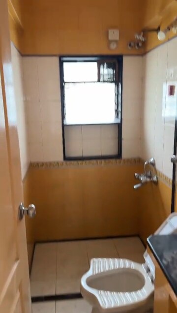 Bathroom in 2 BHK Apartment at Kopar Khairane – for Rent
