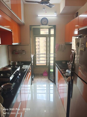 Kitchen in 2 BHK Apartment at Hubtown Greenwoods, Vartak Nagar – for Sale