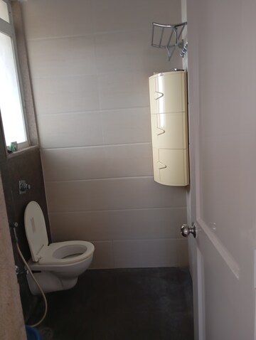 Bathroom in 2 BHK Apartment at Vijay Residency Phase III, Kavesar – for Rent