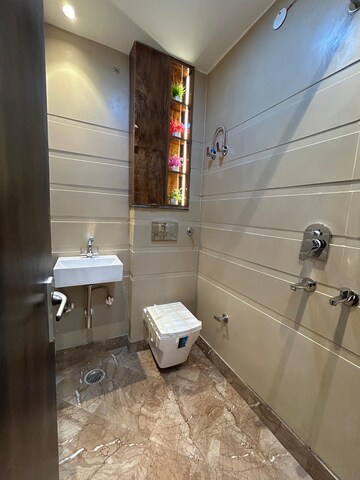 Bathroom in 3 BHK Builder Floor at Dwarka Mor – for Sale