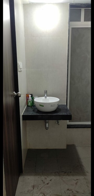 Bathroom in 1 BHK Apartment at JP North Elara, Mira Road – for Rent