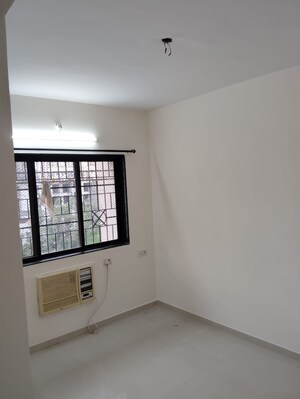 Room in 1 BHK Apartment at Puraniks Kavya Dhara CHS, Dhokali – for Sale