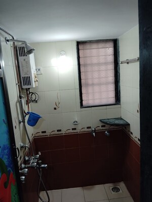 Bathroom in 1 BHK Apartment at Puraniks Kavya Dhara CHS, Dhokali – for Sale