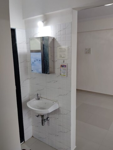 Bathroom in 1 BHK Apartment at Puraniks Kavya Dhara CHS, Dhokali – for Sale