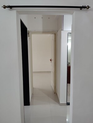 Building Lobby in 1 BHK Apartment at Puraniks Kavya Dhara CHS, Dhokali – for Sale