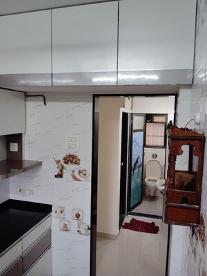 Kitchen in 1 BHK Apartment at Puraniks Kavya Dhara CHS, Dhokali – for Sale