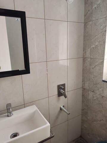 Bathroom in 3 BHK Apartment at Godrej Green Cove, Mahalunge – for Rent
