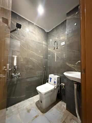 Bathroom in 1 BHK Builder Floor at Freedom Fighters Enclave – for Rent