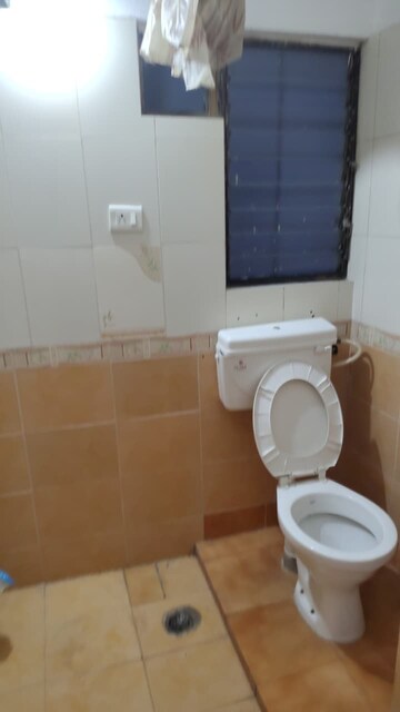 Bathroom in 2 BHK Apartment at Goel Ganga Orchard, Mundhwa – for Rent