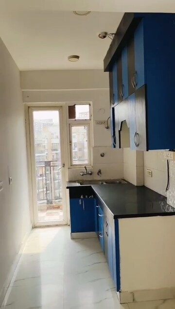 Kitchen in 3 BHK Apartment at Casa Woodstock, Sector 16c Greater Noida – for Sale