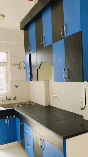 Kitchen in 3 BHK Apartment at Casa Woodstock, Sector 16c Greater Noida – for Sale