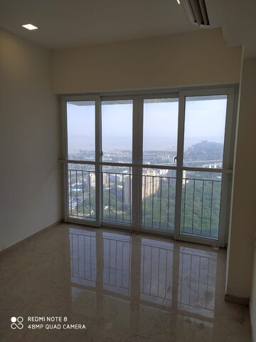 Room in 2 BHK Apartment at Ruparel Ariana, Parel – for Rent