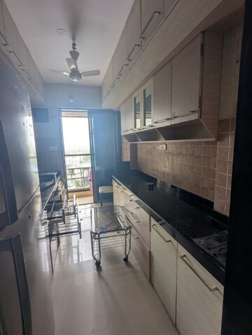 Kitchen in 2 BHK Apartment at Jaydeep Park, Majiwada – for Sale