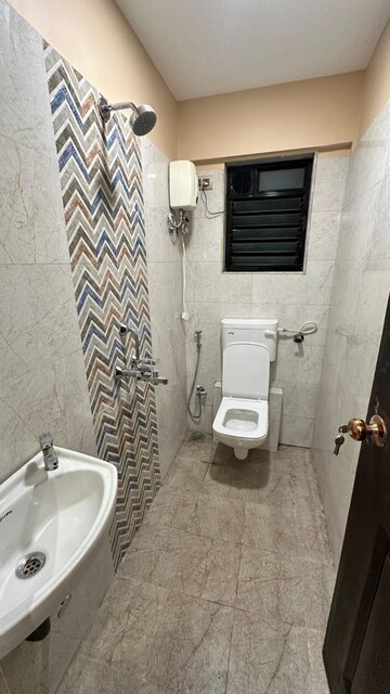 Bathroom in 1 BHK Apartment at Dadar West – for Rent