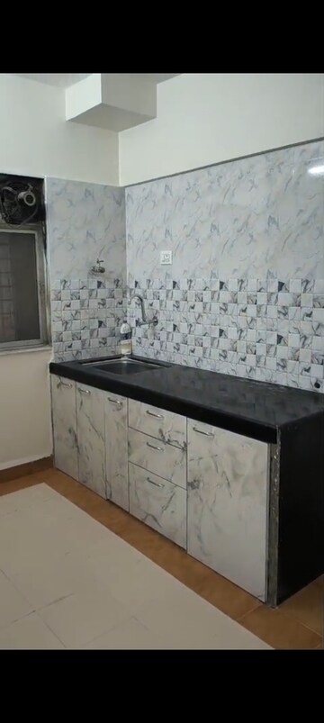 Kitchen in 2 BHK Apartment at Suraj Park, Kalwa – for Rent