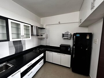 Kitchen in 2 BHK Apartment at Sree Mangal Queens Tower, Aundh – for Rent