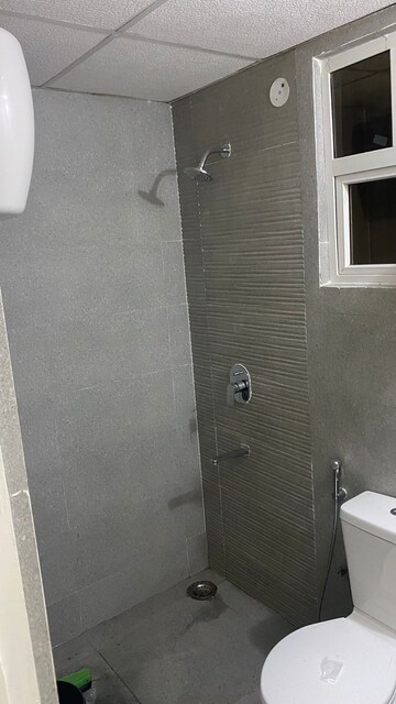 Bathroom in 3 BHK Apartment at Adani M2K Oyster Grande, Sector 102 – for Rent