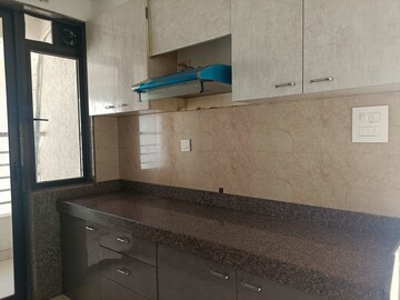 Kitchen in 3 BHK Apartment at Sunteck City Avenue 1, Goregaon West – for Rent