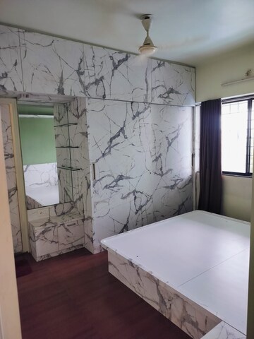 Room in 2 BHK Apartment at Eisha Erica, Dhayari – for Rent
