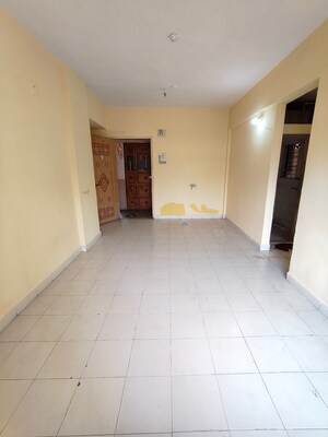 Living Room in 1 BHK Apartment at Madhav Sansar, Kalyan West – for Sale