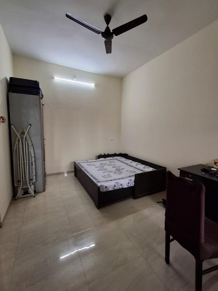 Living Room, ajmera-housing-society 2 Bedroom 1040 Sq.Ft. Apartment In Pimpri Pune 9012097