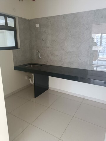 Kitchen in 1 BHK Builder Floor at Paranjape Blue Ridge, Hinjewadi – for Rent