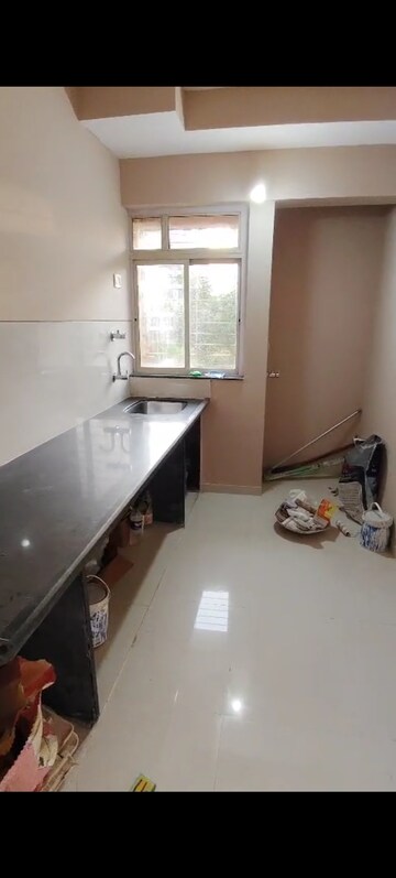 Kitchen in 1 BHK Apartment at Puranik City, Kasarvadavali – for Rent