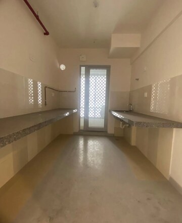 Kitchen in 2 BHK Apartment at Piramal Vaikunth, Balkum Pada – for Rent