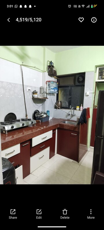 Kitchen in 1 BHK Apartment at Parijat Gardens Marigold CHS, Kasarvadavali – for Rent