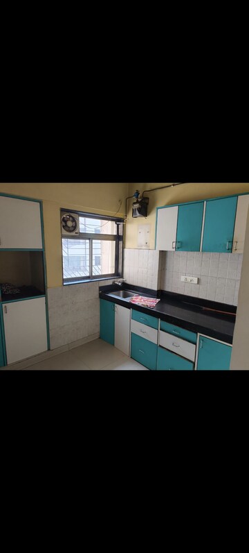 Kitchen in 1 BHK Apartment at Rdc Pinewood, Kasarvadavali – for Rent