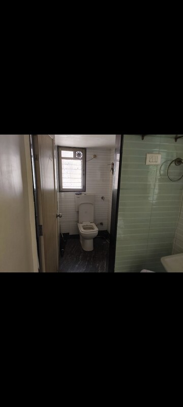 Bathroom in 1 BHK Apartment at Rdc Pinewood, Kasarvadavali – for Rent