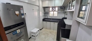 Kitchen in 2 BHK Apartment at Seven Bungalow, Andheri West – for Rent
