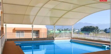 Swimming Pool in 3 BHK Apartment at Windlass River Valley, Harrawala – for Rent