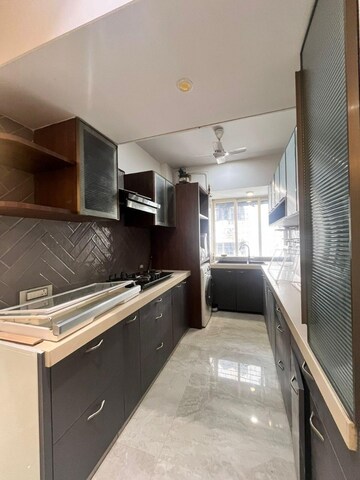 Kitchen in 2 BHK Apartment at Seven Bungalow, Andheri West – for Rent