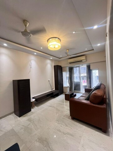 Living Room in 2 BHK Apartment at Seven Bungalow, Andheri West – for Rent