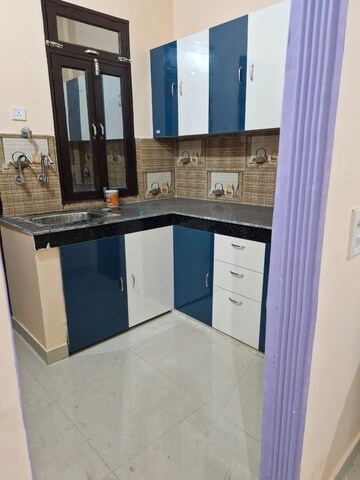 Kitchen in 2 BHK Apartment at Amrapali Golf Homes, Sector 4 Greater Noida – for Rent