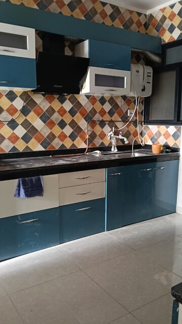 Kitchen in 2 BHK Apartment at Magarpatta Nanded City Sargam, Sinhagad – for Rent