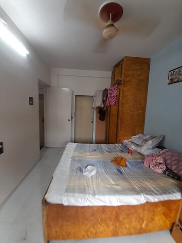 Bedroom in 1 BHK Apartment at Divya Srushti CHS, Kandivali West – for Rent